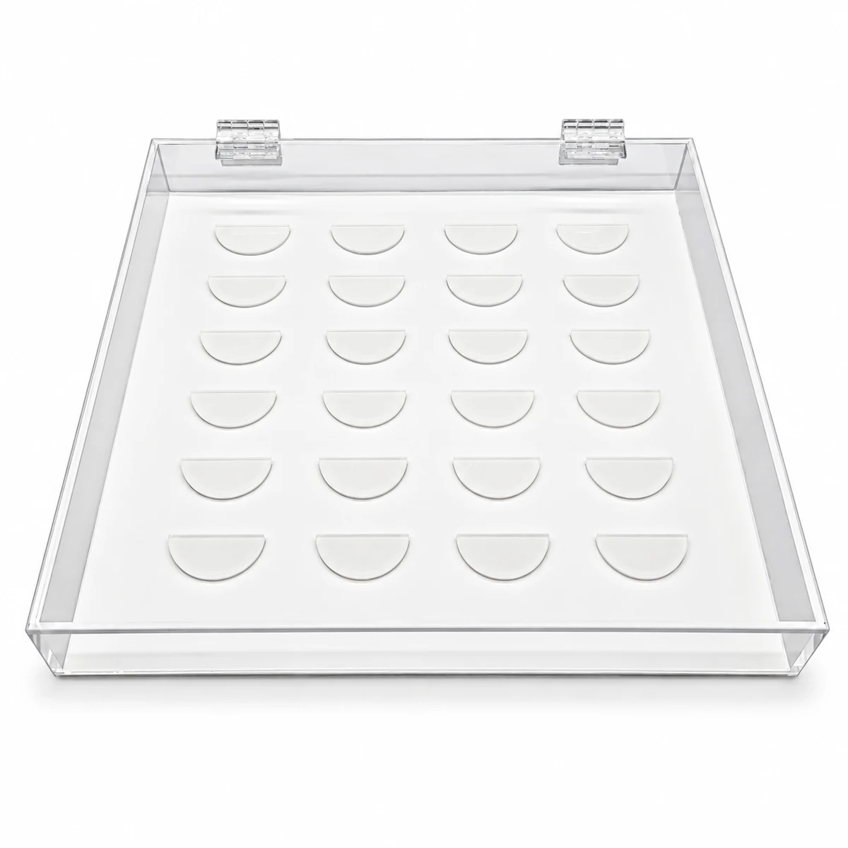 Clear hinged acrylic false lash display case with 24 semicircular holders on a white insert