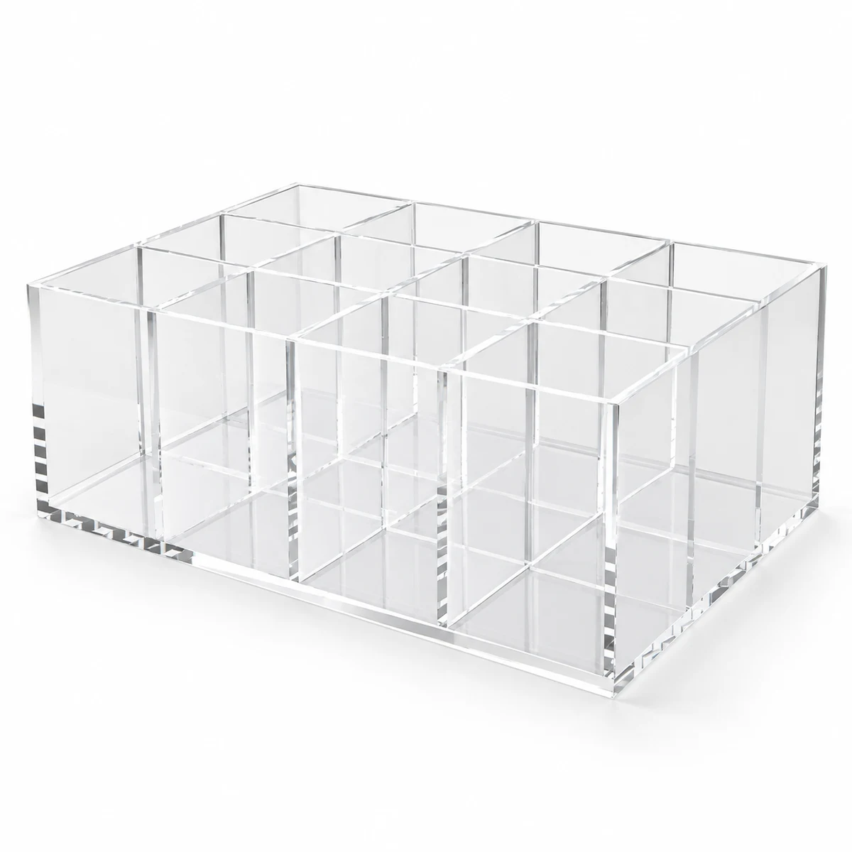 Clear open acrylic organizer with twelve rectangular storage cells in a four by three grid