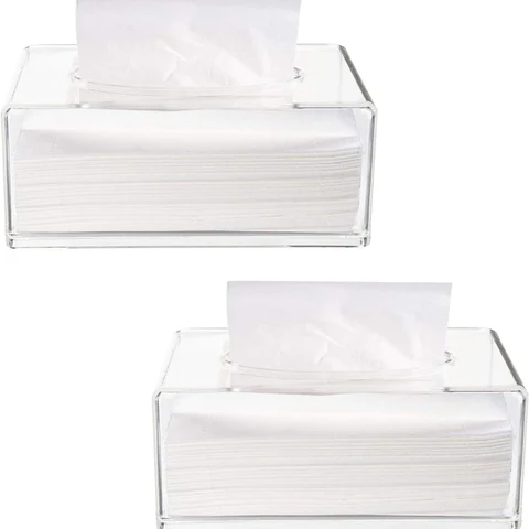 Close view of the oval dispensing opening and transparent rectangular tissue-box body