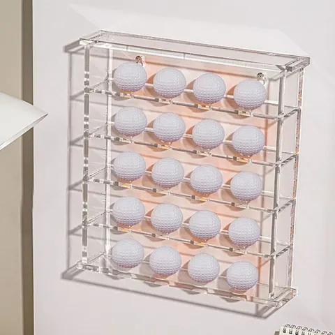 Multi-tier acrylic golf-ball case filled with white balls