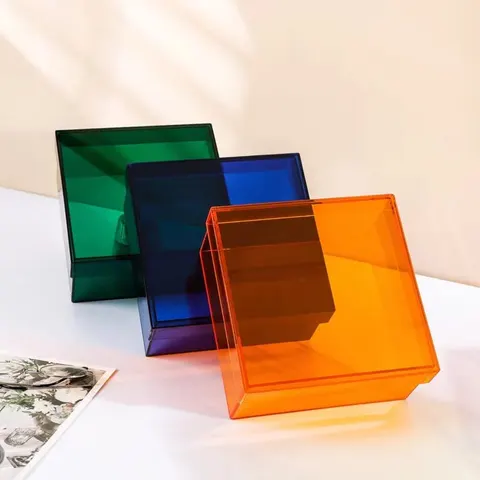Open transparent colored acrylic display boxes in grouped arrangements