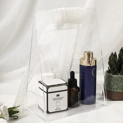 Open transparent gift-bag display with tall panels and cutout handles