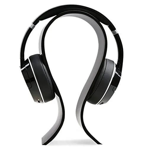 Curved acrylic arch stand supporting an over-ear headset