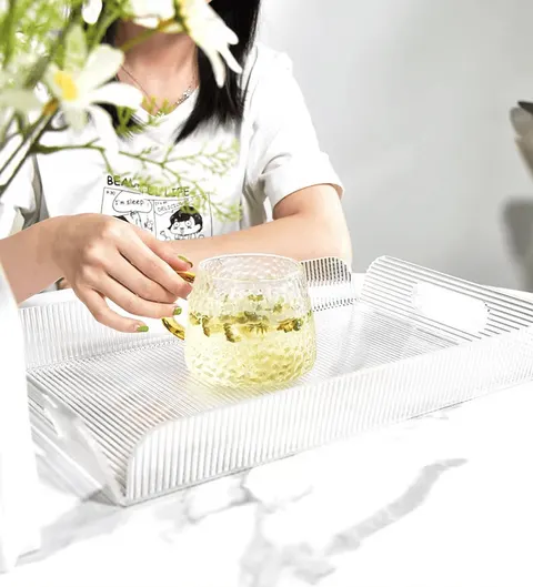 Textured clear acrylic serving tray with raised sides