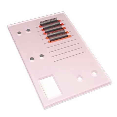 Pink rectangular lash palette with printed guides, magnets and a glue-holder opening