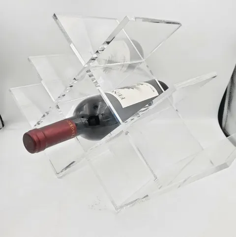 Angled view of a clear diamond-grid wine rack