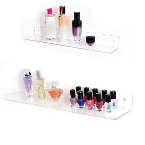 Two clear acrylic wall shelves holding cosmetics and bottles