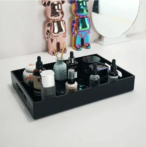 Colored rectangular acrylic serving tray with raised sides and handle openings