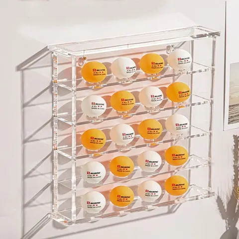 Angled view of a clear cabinet displaying rows of golf balls