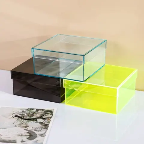 Open transparent colored acrylic display boxes in grouped arrangements
