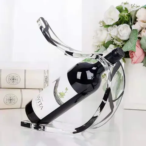 Curved loop-profile acrylic holder displaying a single wine bottle