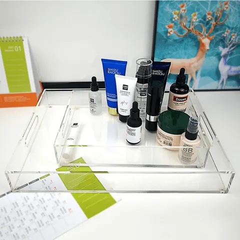 Colored rectangular acrylic serving tray with raised sides and handle openings