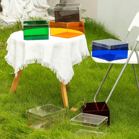 Open transparent colored acrylic display boxes in grouped arrangements