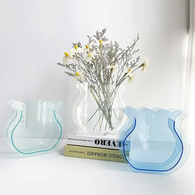 Fishbowl-shaped flower vases in clear and pale colored references
