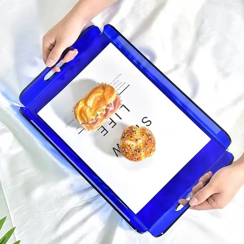 Blue transparent acrylic serving tray with raised edges