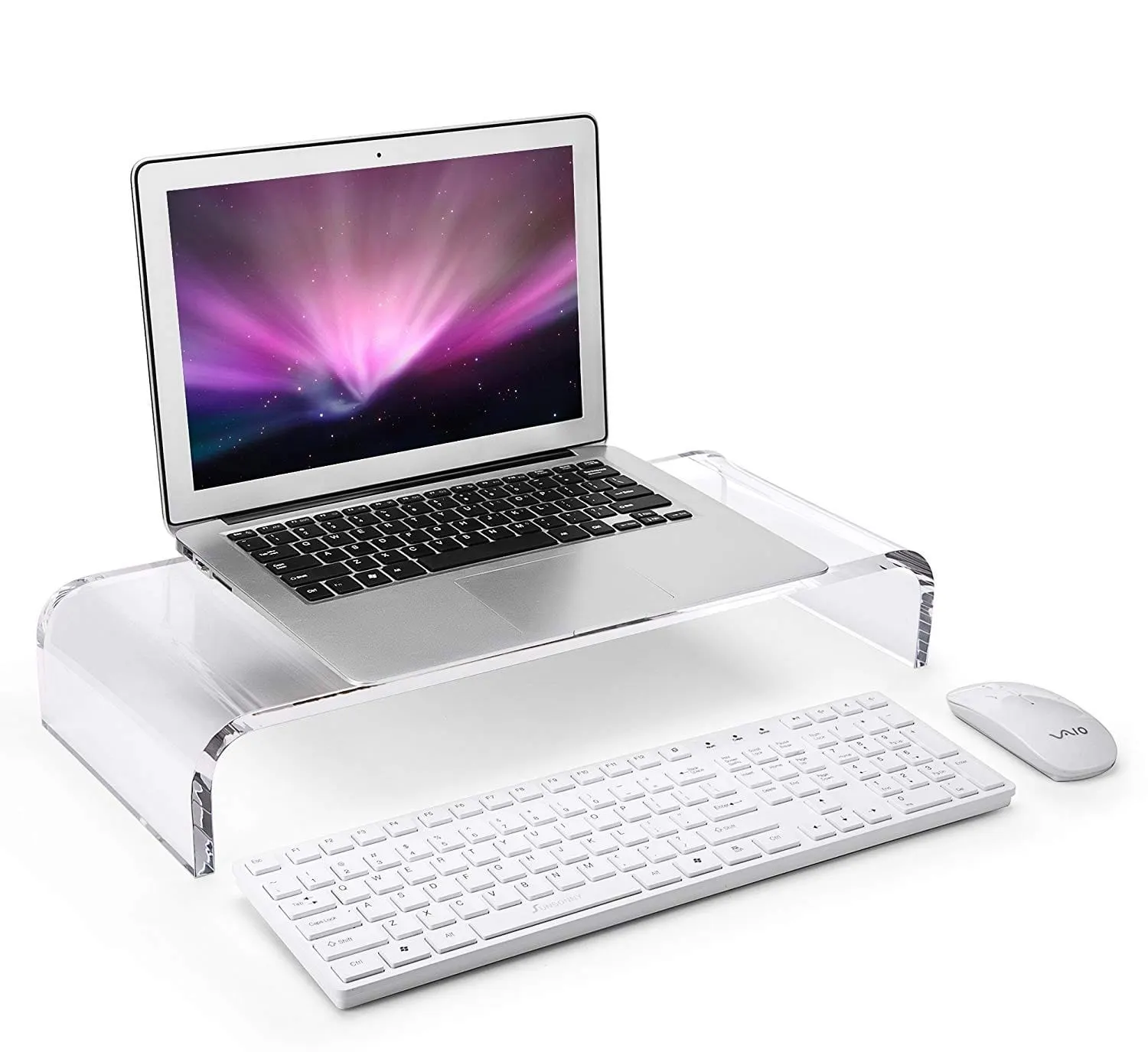 Clear bridge-style acrylic monitor riser above a desk surface