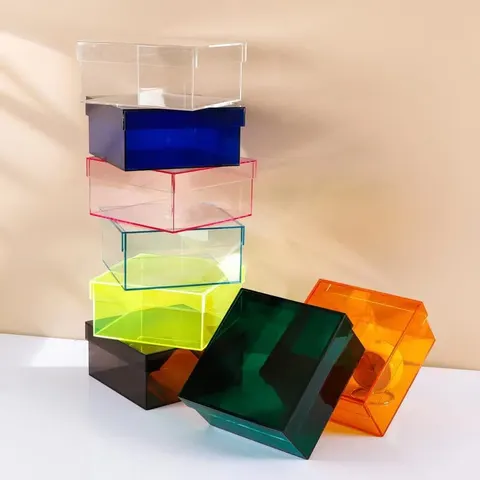 Open transparent colored acrylic display boxes in grouped arrangements