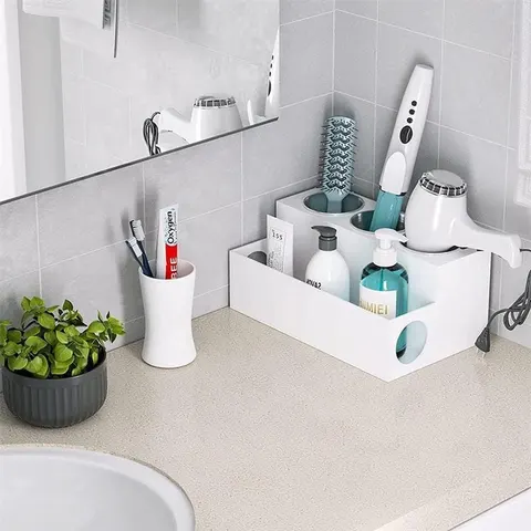 Wall-mounted acrylic bathroom organizer with compartments and a round tool opening