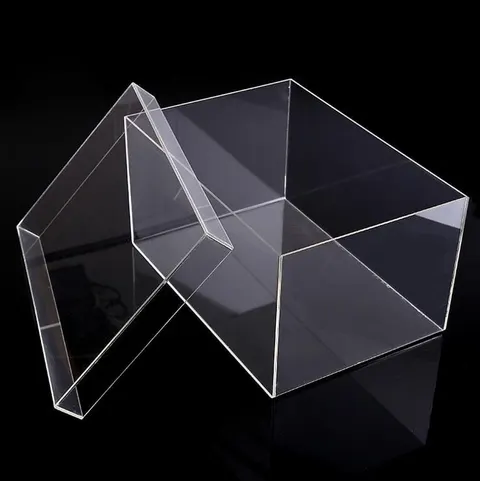 Clear acrylic shoe display box with a hinged opening