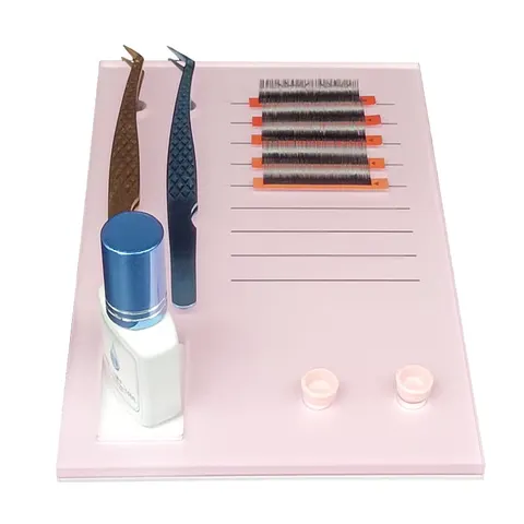 Pink rectangular lash palette with printed guides, magnets and a glue-holder opening